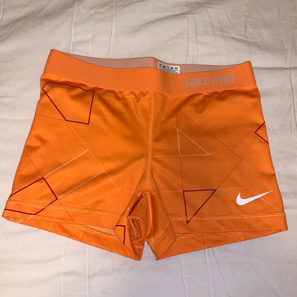Orange patterned Nike pro spandex